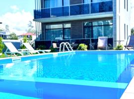Apollo Plus Cottages, hotell i Ureki