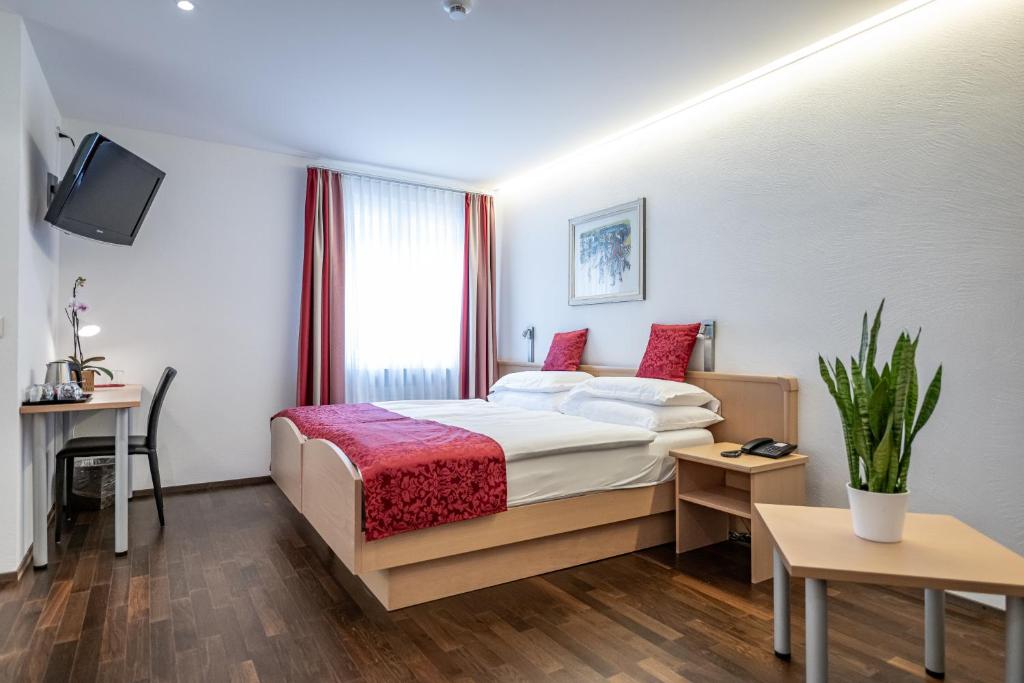 Katil atau katil-katil dalam bilik di Hotel Vorab - Kulinarische Vielfalt