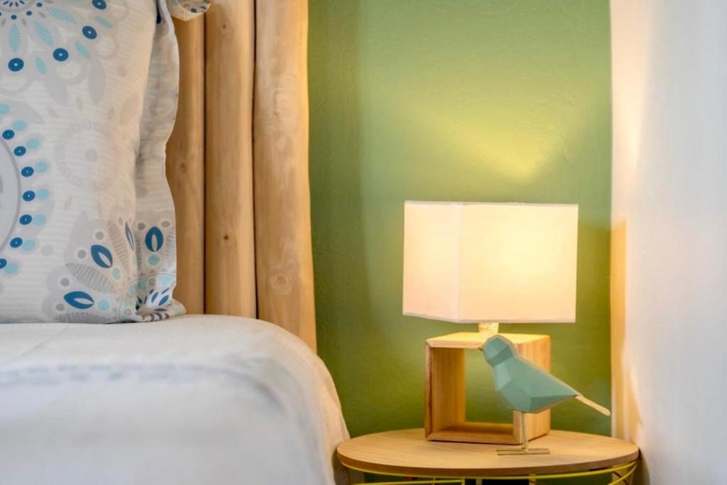 Ein Bett oder Betten in einem Zimmer der Unterkunft LODGE LE Filaos