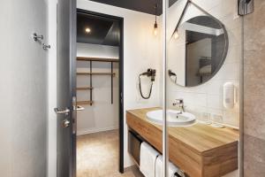 Ένα μπάνιο στο H2 Hotel München Olympiapark +37 φωτογραφίες