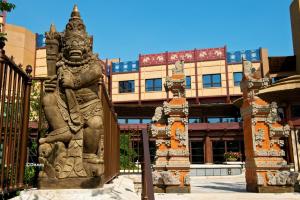 a stone statue in front of a building at Disney Explorers Lodge in Hong Kong