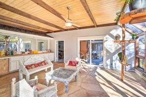 an open living room with a wooden ceiling at 4 Mi to Main Street Spacious Sedona Home in Sedona
