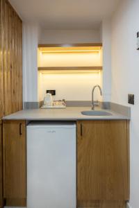 a kitchen with a sink and a counter top at SPNI Eilat Field School in Eilat