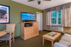 A television and/or entertainment centre at Acadia Inn
