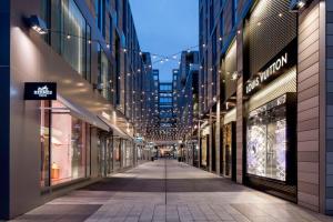 an empty street in a shopping mall at night at Grand Hyatt Washington in Washington