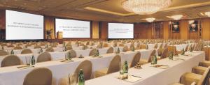 a large conference room with white tables and chairs at Regal Airport Hotel in Hong Kong +37 photos