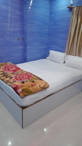 Voodi või voodid majutusasutuse Lodge Babul toas